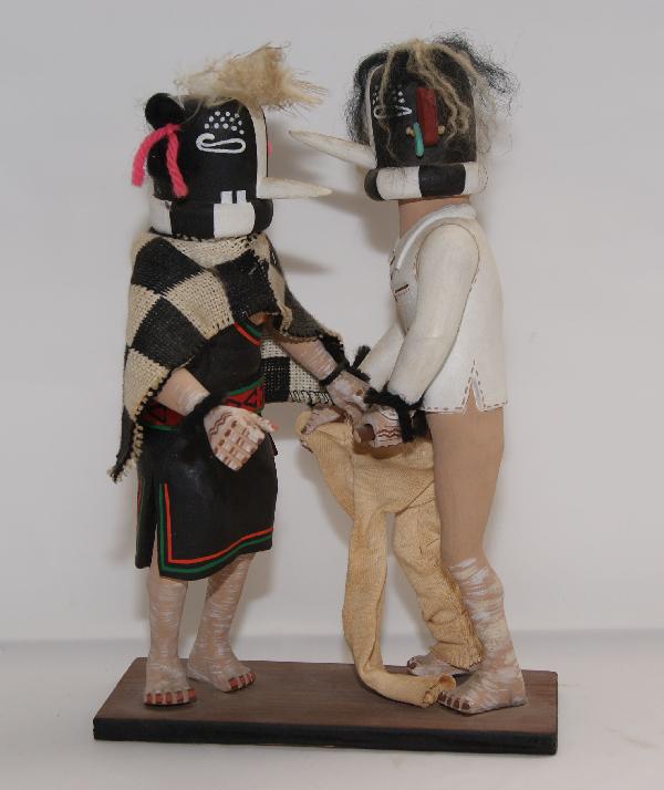 Hopi Kachina Set: 1960s 70s Kokopelle and kokopelle mana, 10.5 inches tall Shipping charge on this item is $15.00.