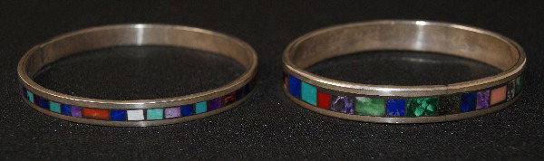 2 Taos Silver Bracelet: 1980s sterling silver channel inlay, both were done by Greg Smith, 6.75 inches in circumference Shipping charge on this item is $10.00. Unless noted all ite
