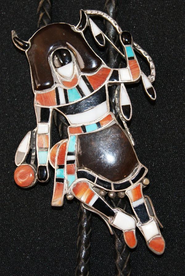 Zuni Bolo: 1940s 50s sterling silver channel inlaid buffalo design 3.5" x 2.25" Shipping charge on this item is $10.00. Unless noted all items have some amount of acce