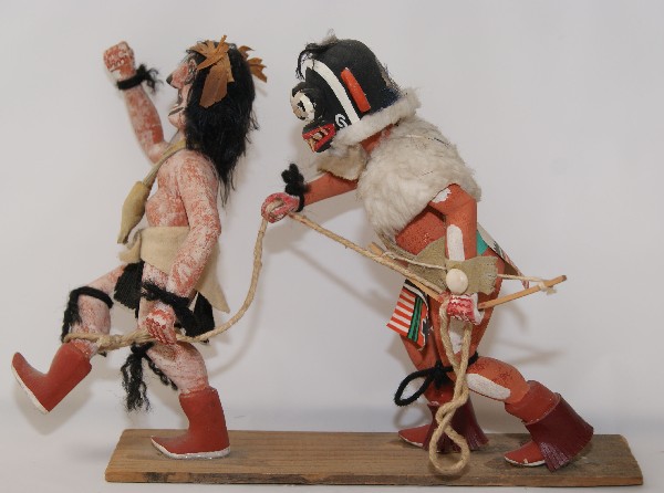 Pair of Hopi Kachinas: 1960s 70s carved of cottonwood root mounted on board, 7 inches tall 2.25 inches wide Shipping charge on this item is $15.00. <
