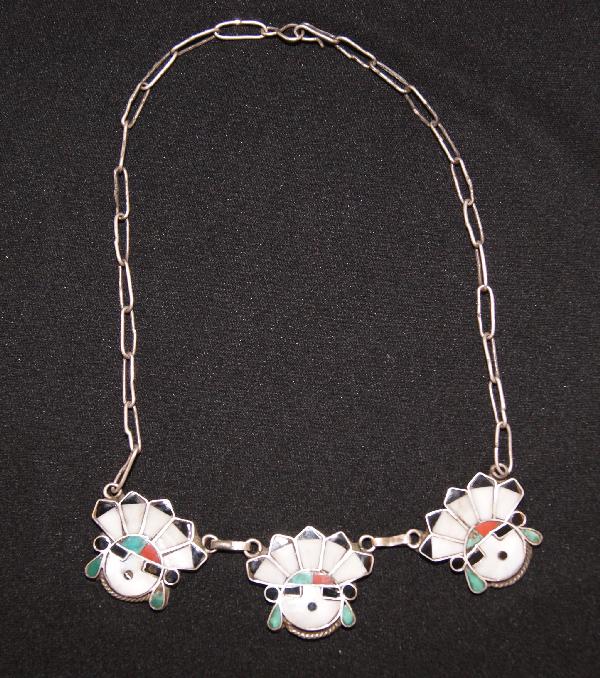 Zuni Necklace: 1940s 50s sterling silver cluster inlaid face with hand made chain 16 inches long Shipping charge on this item is $10.00.
