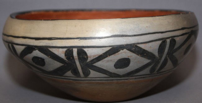 SANTO DOMINGO CHILE BOWL: 1960's geometric design, 4" x 8" Shipping charge on this item is $10.00. Unless noted all items have some amount of acceptable wear, scratches, nicks, missing stitches, ect. for their age. Measurement