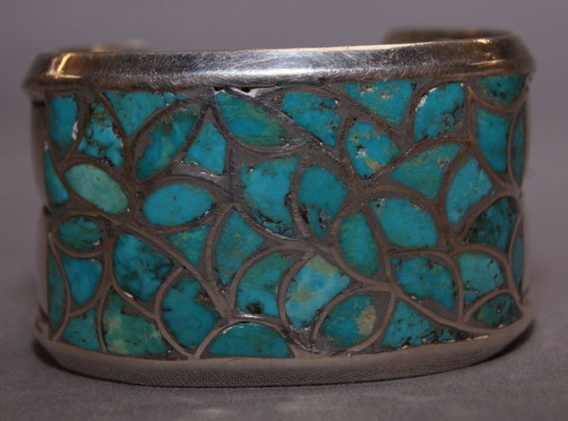 NAVAJO BRACELET: 1960s 70s sterling silver channel inlay, 1.25" x 5" x 1" opening Shipping charge are for the United States. The shipping on this lot is $10.00. Outside the United States there will be additional shipp