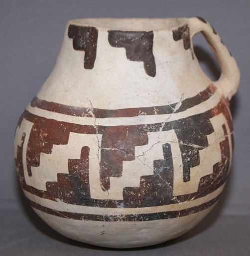 ANASAZI POTTERY PITCHER: prehistoric black on white has been restored, 6" x 6" Shipping charge are for the United States. The shipping on this lot is $10.00. Outside the United States there will be additional shipping fees. U