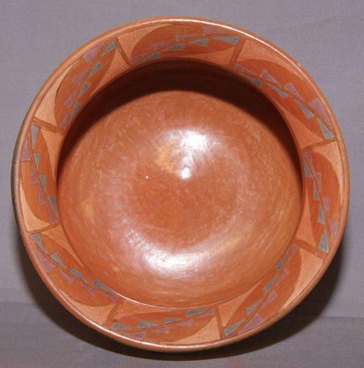 HOPI/NAVAJO POTTERY BOWL: 1893 micaceous clay polychrome painted rim signed Nathan Begay, 4" x 7.5" Shipping charge are for the United States. The shipping on this lot is $10.00. Outside the United States there will be additio