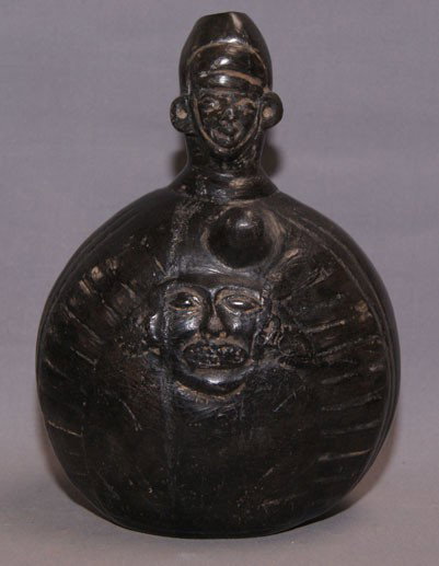 PRE-COLUMBIAN POTTERY EFFIGY JAR: prehistoric nassca restored black ware, 9" x 7" x 4" Shipping charge are for the United States. The shipping on this lot is $10.00. Outside the United States there will be additional shipping fees. Un