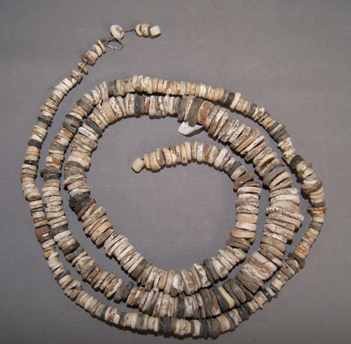 PUEBLO SHELL NECKLACE: prehistoric pump drilled shell out of california museum, 46"long Shipping charge are for the United States. The shipping on this lot is $10.00. Outside the United States there will be additional shipp