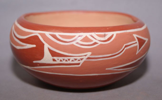 SANTA CLARA POTTERY BOWL: 1980s white on red has minor rubbing and pitting signed Maria 2" x 4.5" Shipping charge are for the United States. The shipping on this lot is $10.00. Outside the United States there will be additiona
