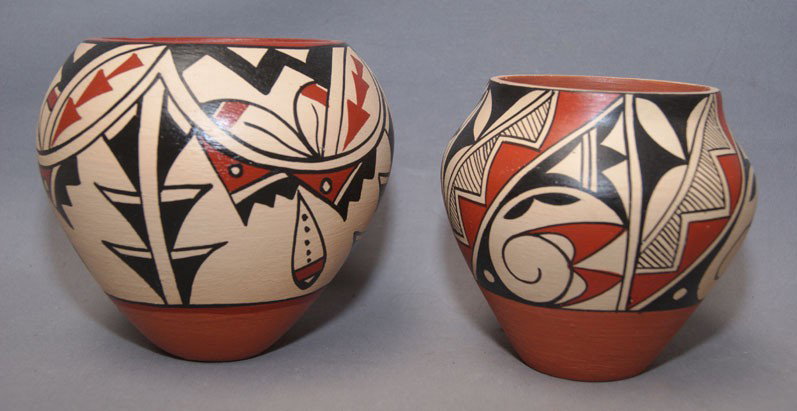2 JEMEZ POTTERY JARS: 1980s 90s minor paint chipping largest signed J. Baca 5" x 5" smallest signed T. Toga 4" x 4.5" Shipping charge are for the United States. The shipping on this lot is $10.00. Outside the United States