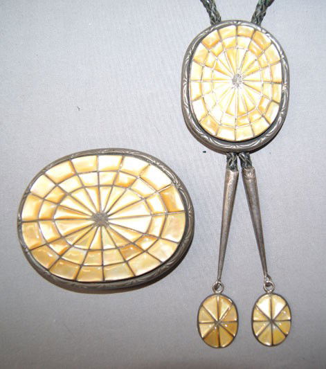 NAVAJO JEWELRY SET: 1970s sterling silver and mother of pearl bolo 2.25" x 2" with matching tips buckle 2.5" x 3" signed BB Shipping charge are for the United States. The shipping on this lot is $10.00. Outside the Unite