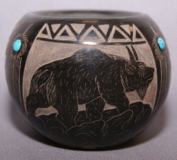 SIOUX POTTERY BOWL: 1980s sgraffito design inlaid turquoise signed a Red Starr, 2 1/2 inches X 3.25 inches, Shipping charge are for the United States. The shipping on this lot is $10.00. Outside the United States there w
