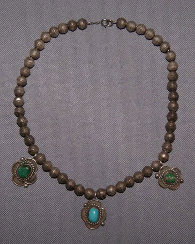 NAVAJO NECKLACE: 1960s-70s sterling silver and turquoise hand made beads, 15.5" long Shipping charge on this item is $10.00. Unless noted all items have some amount of acceptable wear, scratches, nicks, missing stitch