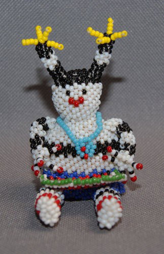 ZUNI BEADED DOLL: 1980s koshari eating watermelon by Jeannie Milker, 2.5" x 2" Shipping charge on this item is $10.00. Unless noted all items have some amount of acceptable wear, scratches, nicks, missing stitches, ect
