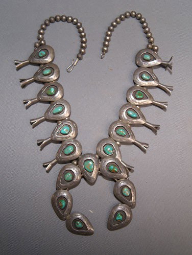 NAVAJO SQUASH BLOSSOM NECKLACE: 1960s 70s sterling silver and turquoise, 25" long Shipping charge on this item is $10.00. Unless noted all items have some amount of acceptable wear, scratches, nicks, missing stitches, ect. for their