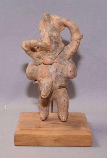 COLIMA POTTERY IDOL: 300 AD phallic dancer with dog head, 6" tall Shipping charge are for the United States. The shipping on this lot is $10.00. Outside the United States there will be additional shipping fees. Unless not