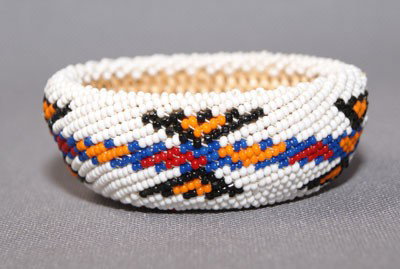 PAIUTE BEADED BASKET: 1950-60's fully beaded with multi colored beaded design, 1" X 2.75" Shipping charge are for the United States. The shipping on this lot is $10.00. Outside the United States there will be additional sh