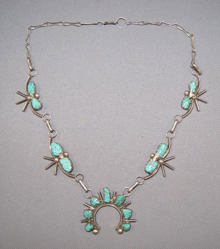 NAVAJO NECKLACE: 1960s 70s sterling silver and turquoise with handmade link style chain 20 inches long Shipping charge are for the United States. The shipping on this lot is $10.00. Outside the United States there wil