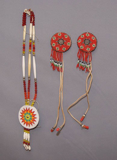 PLAINS BEADED ITEMS: 1970s 80s two hair ties one necklace one hair tie missing beads hair ties 2.5" in diameter beaded rosette on necklace 3" in diameter Shipping charge are for the United States. The shipping on this lot
