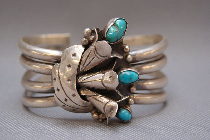 NAVAJO BRACELET: 1970s 80s sterling silver with three turquoise stones 1.75" x 5.5" with 1" opening Shipping charge are for the United States. The shipping on this lot is $10.00. Outside the United States there will b