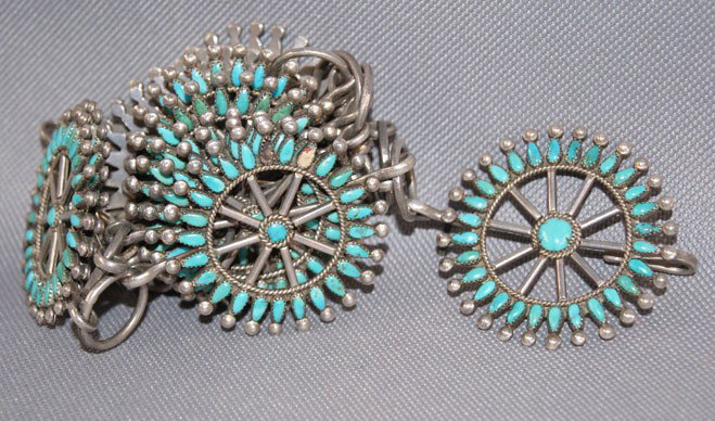NAVAJO CONCHO BELT: 1960s 70s sterling silver and turquoise link style 12 Concho's 1.5 inches in diameter 36 inches long has nine missing stones Shipping charge are for the United States. The shipping on this lot is $10.