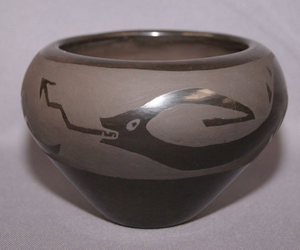 SANTA CLARA POTTERY BOWL: 1960s 70s matte on black design has surface scratching and rubbing signed Howard N 4" x 5.5" Shipping charge are for the United States. The shipping on this lot is $10.00. Outside the United States th