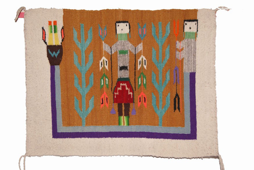 NAVAJO TEXTILE: 1960s 70s single figure yei with bent rainbow God 18" x 23.5" Shipping charge are for the United States. The shipping on this lot is $10.00. Outside the United States there will be additional shipping