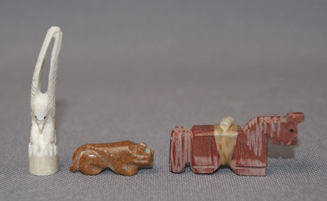THREE ZUNI FETISHES: 1980s 90s eagle carved from horn signed with logo horse is Pipestone tallest one 2" x 2.5" Shipping charge are for the United States. The shipping on this lot is $10.00. Outside the United States ther