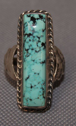 NAVAJO RING: 1970s 80s sterling silver and turquoise size 8 Shipping charge are for the United States. The shipping on this lot is $10.00. Outside the United States there will be additional shipping fees. Unless n