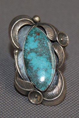 NAVAJO RING: 1960s 70s sterling silver and turquoise signed with shop logo for Carl Luthy, size 6.5 Shipping charge are for the United States. The shipping on this lot is $10.00. Outside the United States there wi