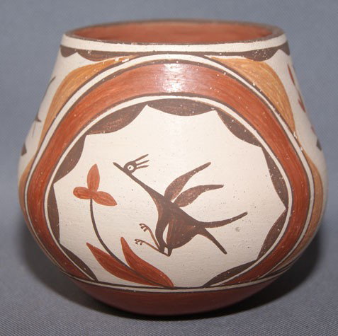 ZIA POTTERY JAR: 1970s 80s Polychrome design with birds has pits signed Gloria Gachupin 4.75" x 5" Shipping charge are for the United States. The shipping on this lot is $10.00. Outside the United States there will be