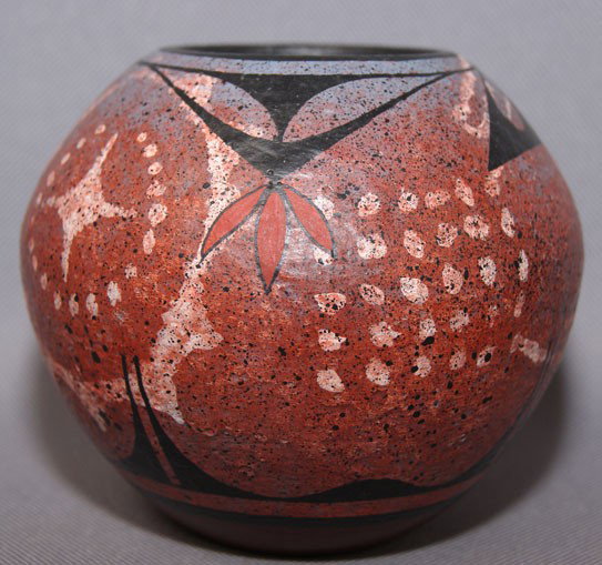 SAN FELIPE POTTERY JAR: contemporary painted with acrylic paint signed R. Aragon, 3.5" x 4" Shipping charge are for the United States. The shipping on this lot is $10.00. Outside the United States there will be additional sh