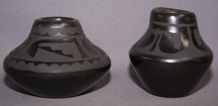 TWO SANTA CLARA POTS: 1980's 90s' matte on black design both have surface rubbing and scratches largest one signed Lucy Martinez, 3.5" x 4.5" small one 3.5" x 3.5" Shipping charge are for the United States. The shipping on