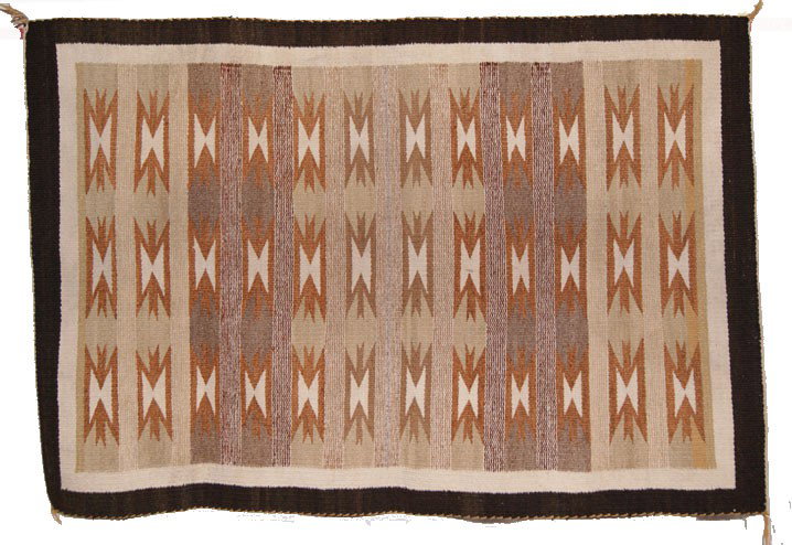 NAVAJO TEXTILE: 1960s 70s banded design Crystal 48" x 32" has minor moth damage Shipping charge are for the United States. The shipping on this lot is $10.00. Outside the United States there will be additional shippi