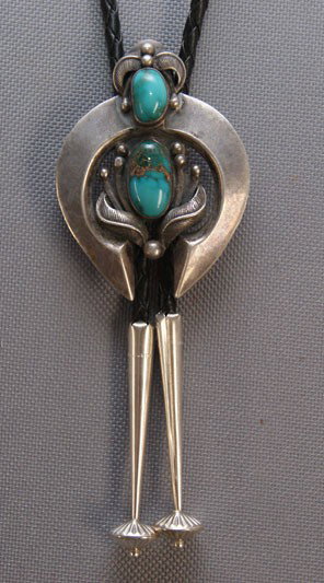 NAVAJO BOLO SLIDE: 1960s 70s sterling silver and turquoise 2.25" x 1.75" Shipping charge are for the United States. The shipping on this lot is $10.00. Outside the United States there will be additional shipping fees. U