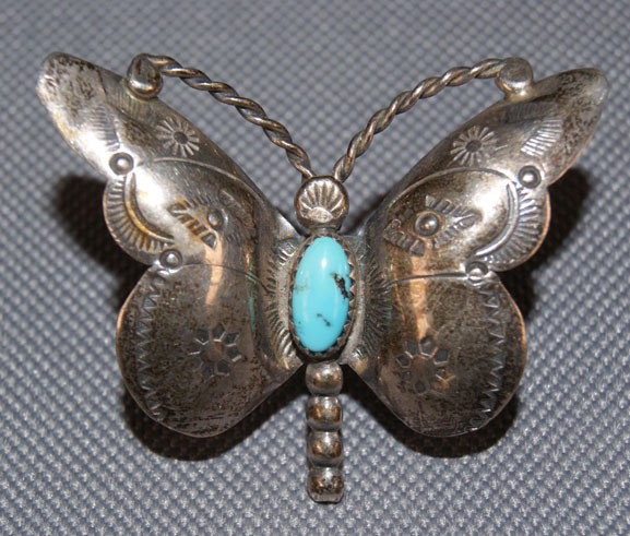 NAVAJO BOLO SLIDE: 1960s 70s sterling silver butterfly with single turquoise stone, marked HT 1.5" x 1.75" Shipping charge are for the United States. The shipping on this lot is $10.00. Outside the United States there w
