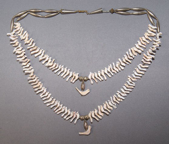 NAVAJO TWO STRAND FETISH NECKLACE: 1960s 70s sterling silver with hand carved birds 19 inches long Shipping charge are for the United States. The shipping on this lot is $10.00. Outside the United States there will be additional shippi