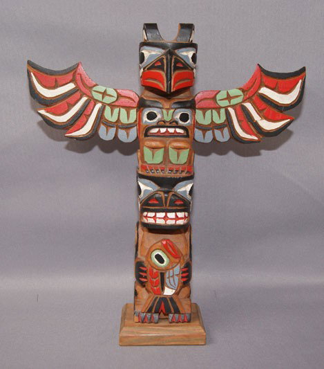 NORTHWEST COAST TOTEM POLE: 1980s hand carved and painted cedar signed M Alphonse wing broken and glued 13" x 11.5" Shipping charge are for the United States. The shipping on this lot is $10.00. Outside the United States there w