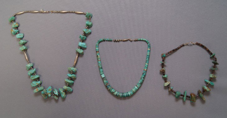 THREE NAVAJO NECKLACES: 1960s 70s sterling silver turquoise and shell heshi 22 inches long 14 inches long and 13 inches long Shipping charge are for the United States. The shipping on this lot is $10.00. Outside the United S
