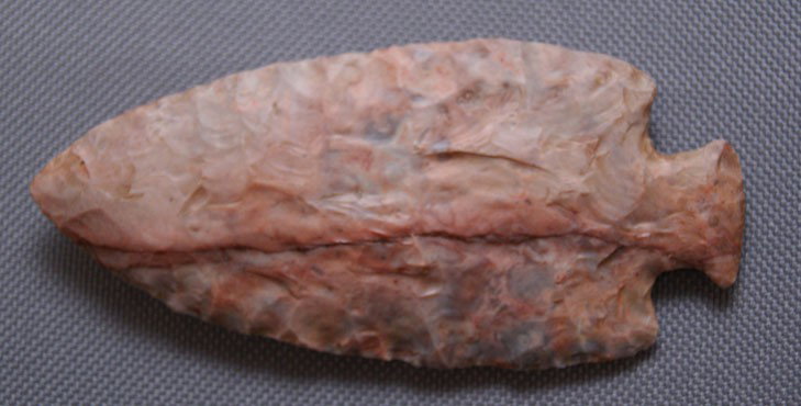 STONE SPEAR POINT: contemporary copy of prehistoric 4" x 1.75" Shipping charge are for the United States. The shipping on this lot is $10.00. Outside the United States there will be additional shipping fees. Unless note