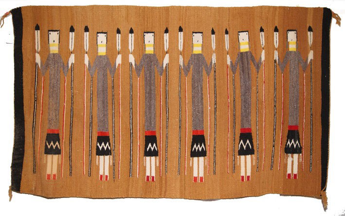 NAVAJO YEI TEXTILE: 1960s 70s six-figure design has holes moth damage and stains 32" x 58" Shipping charge are for the United States. The shipping on this lot is $10.00. Outside the United States there will be additional
