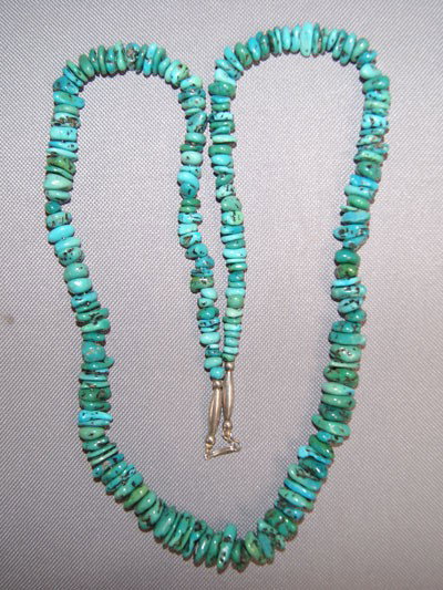 NAVAJO NUGGET NECKLACE: 1970s 80s turquoise nugget and sterling silver ends 32 inches long Shipping charge are for the United States. The shipping on this lot is $10.00. Outside the United States there will be additional shi