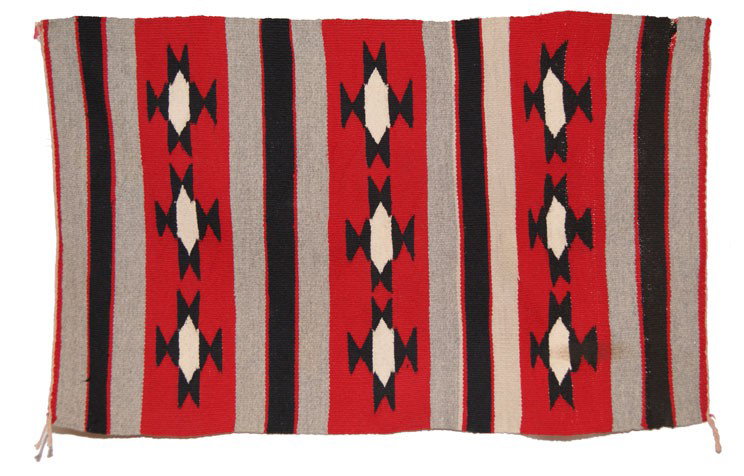 NAVAJO TEXTILE: 1960s 70s banded design showing minor damage and stains 17" x 21" Shipping charge are for the United States. The shipping on this lot is $10.00. Outside the United States there will be additional ship