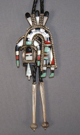 ZUNI BOLO TIE: 1960s 70s sterling silver has stone to stone inlay and sterling silver tips 3.75" x 2.25" Shipping charge are for the United States. The shipping on this lot is $10.00. Outside the United States there
