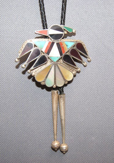 ZUNI BOLO TIE: 1960s 70s sterling silver channel inlaid Bird with sterling tips 2" x 2.5" Shipping charge are for the United States. The shipping on this lot is $10.00. Outside the United States there will be additi