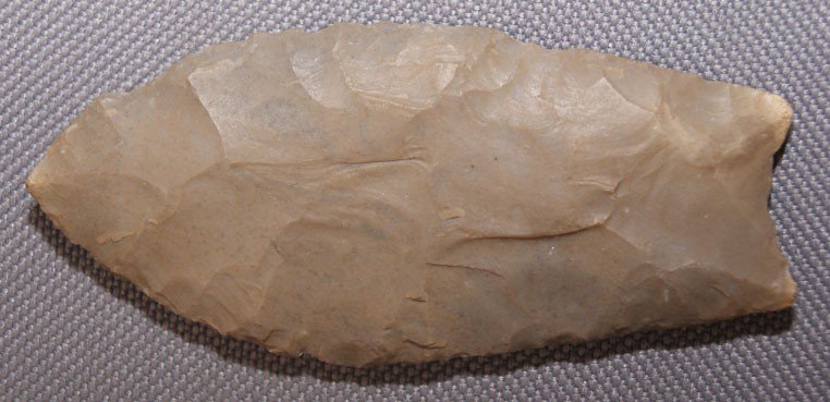 STONE SPEAR POINT: contemporary copy of prehistoric artifact, 3" x 1.25" Shipping charge are for the United States. The shipping on this lot is $10.00. Outside the United States there will be additional shipping fees. U