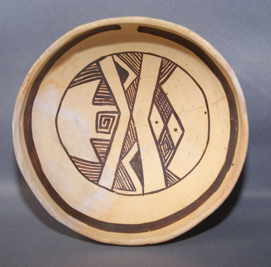 JEDDITO POTTERY BOWL: prehistoric geometric design broken include less than 1% plaster and repaint, 3.5" x 8.5" Shipping charge are for the United States. The shipping on this lot is $10.00. Outside the United States there