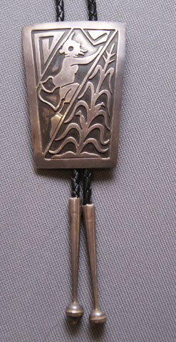 Navajo silver Bolo: 1970s 80s cornstalk in mud head design, 2.75" x 1.75" Shipping charge are for the United States. The shipping on this lot is $10.00. Outside the United States there will be additional shipping fees. U