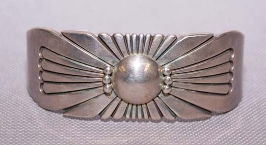 NAVAJO SILVER BRACELET: 1970s - 80s geometric design signed J Jim 5.75 x 1" x 1" Shipping charge are for the United States. The shipping on this lot is $10.00. Outside the United States there will be additional shipping fees