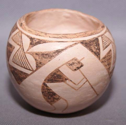 ACOMA POTTERY JAR: 1950s geometric and kokopelli design signed Lucy M Lewis 2.5" x 3" Shipping charge are for the United States. The shipping on this lot is $10.00. Outside the United States there will be additional shi