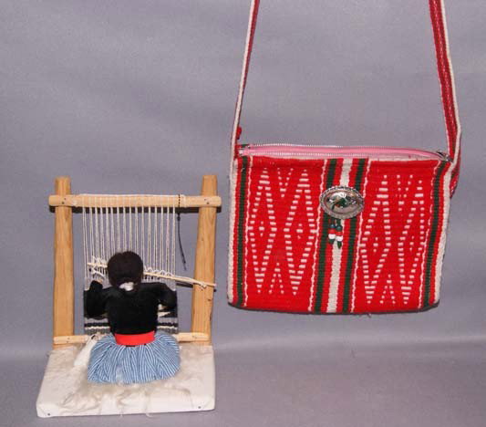 NAVAJO DOLL AND PURSE: 1950s- 60s weaver doll 10" x 8" x 6" and sash design purse 8" x 10" Shipping charge are for the United States. The shipping on this lot is $15.00. Outside the United States there will be additional sh